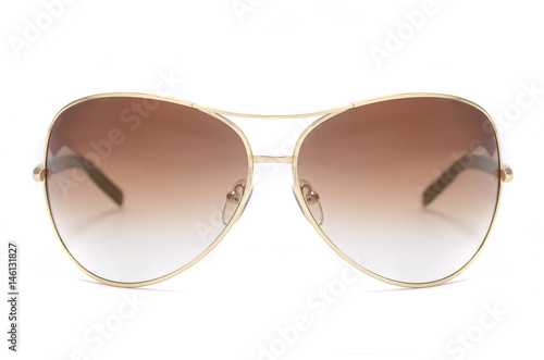 Sunglasses in an iron frame with brown glass isolated on white