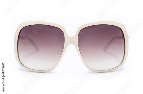 womans sunglasses in white wide frame and brown glass isolated