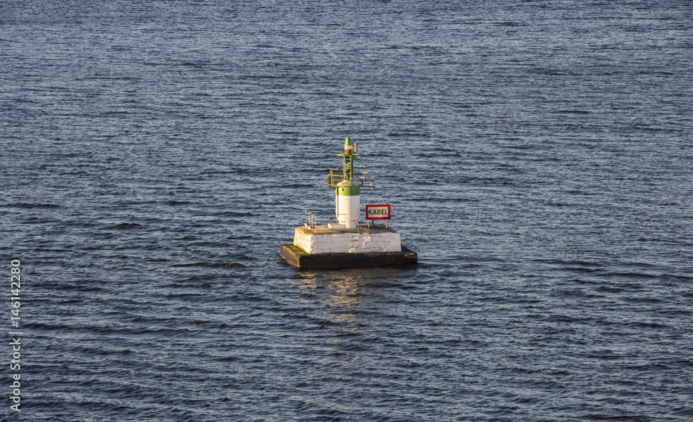 Warning floating buoy indicates the underwater sea cabel way (Kabel ...