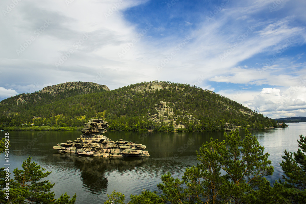 Borovoe lake and stone sculprure jumbaktas, Burabay National park in Northern Kazakhstan.