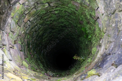 Deep water well in the town, inside. Slovakia