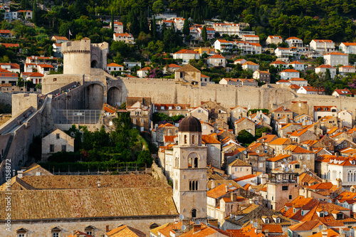 Protective city wall, Minceta tower and Franciscan Monastery and Museum in Dubrovnik, Croatia. photo