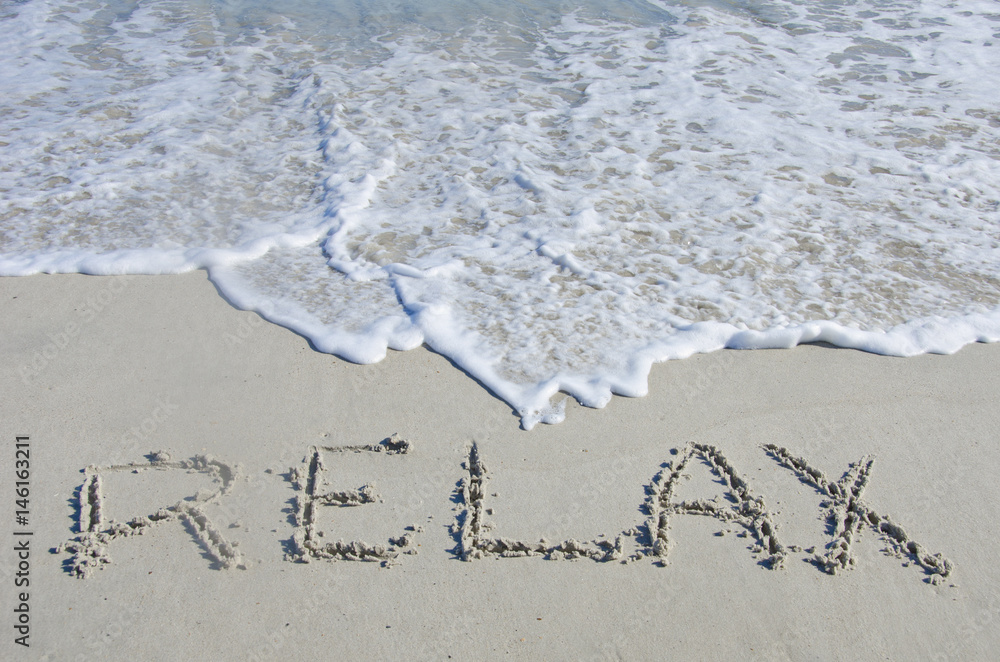 Fototapeta premium Relax Written in the Sand