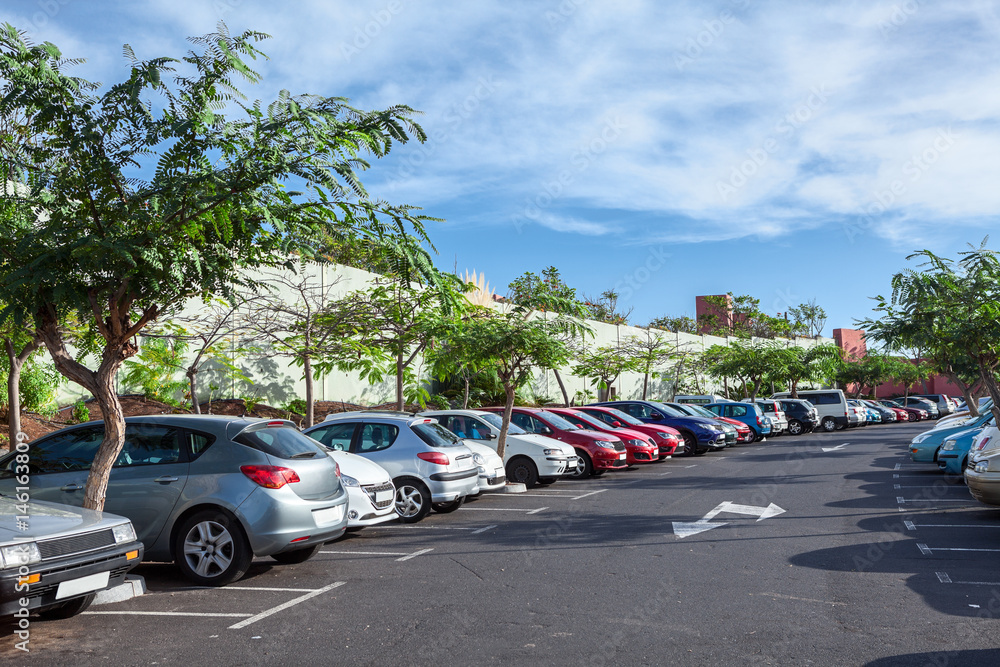 Open air parking lot full of cars. Park and ride area. Tenerife, Canary, Spain