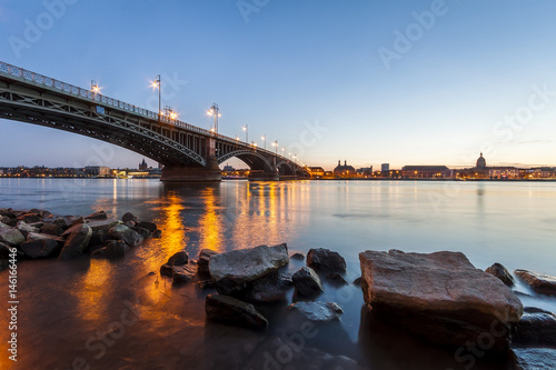 Bild auf Leinwand Beautiful sunset over Rhine / Rhein river and old bridge in Mainz near Frankfurt am Main, Germany