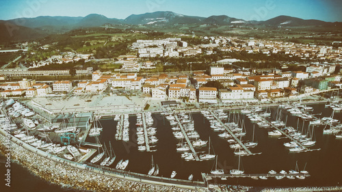 Aerial view of San Vicenzo in Tuscany. Port and city skyline photo