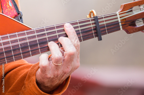 Intentionally blurred image playing and strumming beautiful electric lute guitar  Oud  for banner