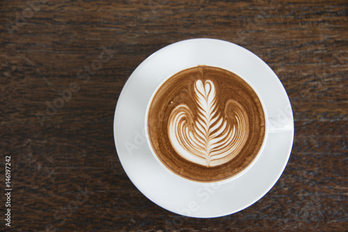 a cup of coffee , cappuccino art , latte art , latte , cappuccino
