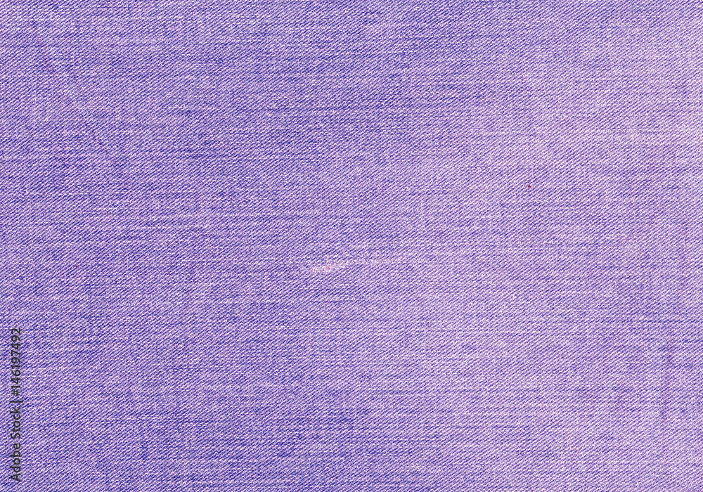 Fototapeta premium Purple jeans textile texture.