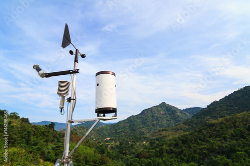 Weather station over the dam with mountain background