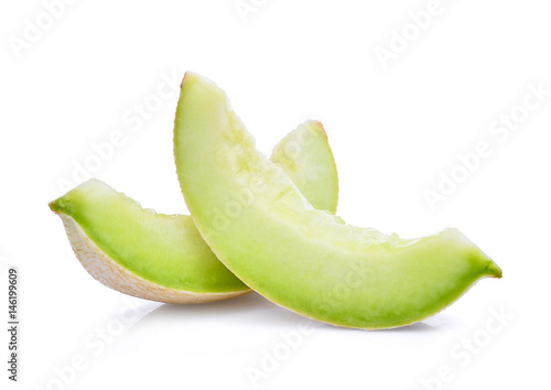 slice of green cantaloupe melon isolated on white background