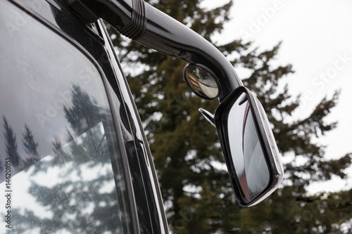 Rear view mirror with modern bus