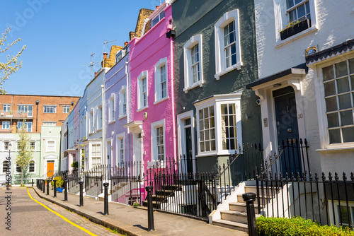 Pastel colored restored Victorian British houses in an elegant mews in Chelsea, London, UK photo