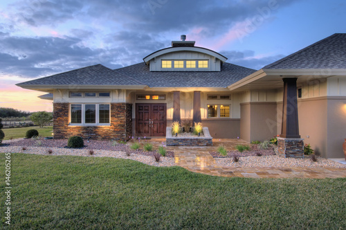 Front elevation custom home with landscaping