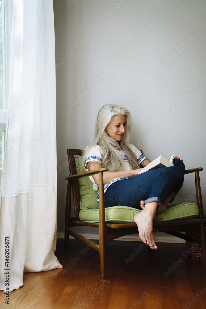Sitting on sale in armchair