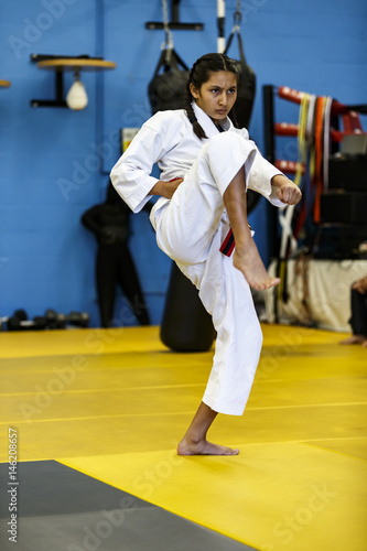 Girl doing Karate testing for Black Belt