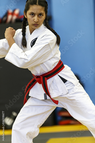 Girl doing Karate testing for Black Belt