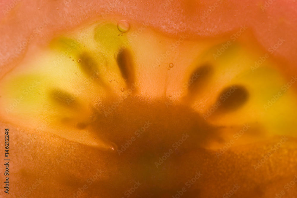 sliced tomate with light coming through sliced tomate with light coming through