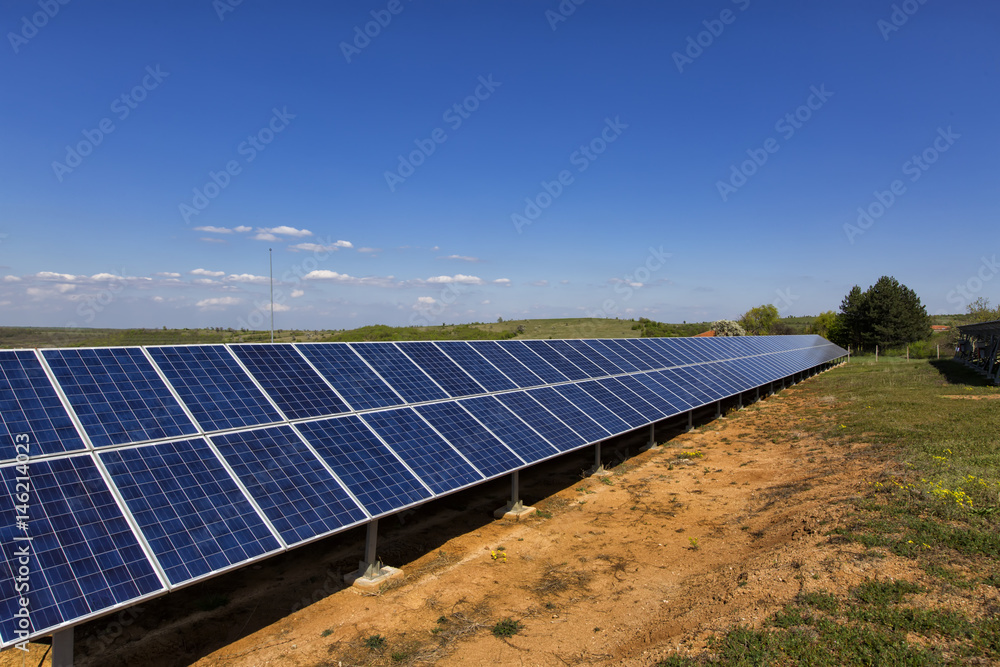 Solar cell panels in a photovoltaic power plant. Renewable energy - alternative electricity source