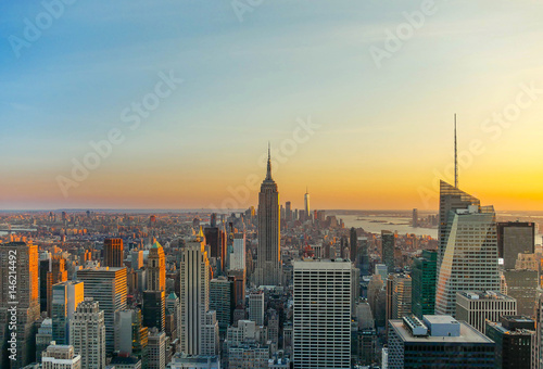 New York City skyline with urban skyscrapers at sunset © cocozero003