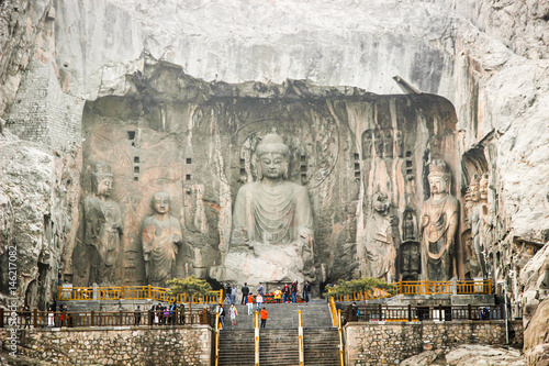 Cliff stone carving Buddha statue at Longmen Grottoes, Luoyang, Henan, China