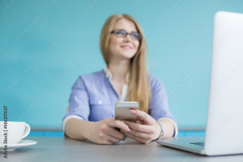 Portrait of a businesswoman working at office reading a letter in a desktop Portrait of a businesswoman working at office reading a letter in a desktop