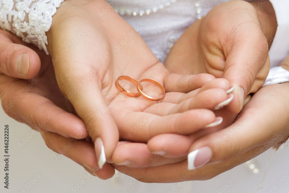 Newlyweds with gold wedding rings Newlyweds with gold wedding rings