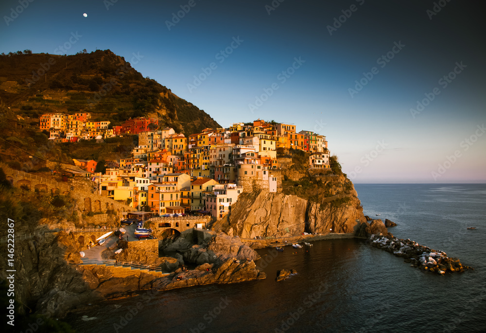 travel amazing Italy series - village of Manarola, Liguaria on the Cinque Terre coast at sunset