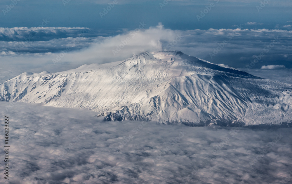 Mount Etna on Sicily Island, Italy seen from plane window