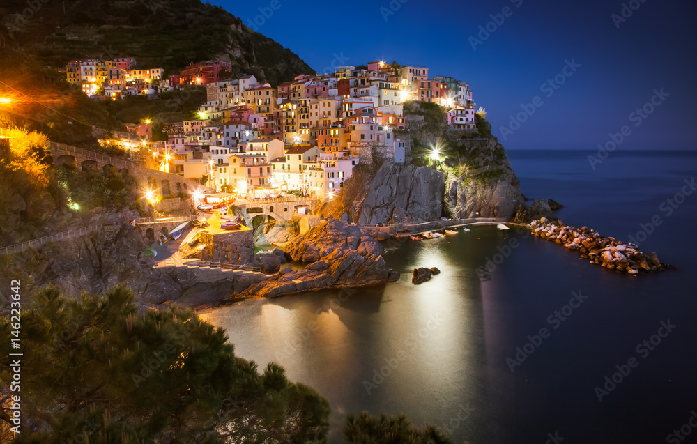travel amazing Italy series - scenic night view of colorful village Manarola, Cinque Terre
