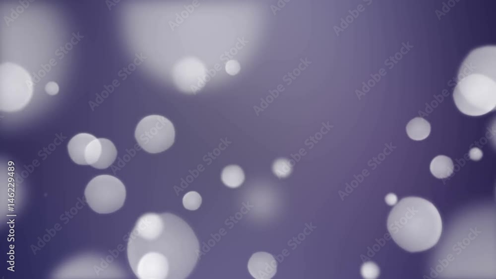 Seamless animation of bokeh lights rising up against dark purple background Seamless animation of bokeh lights rising up against dark purple background