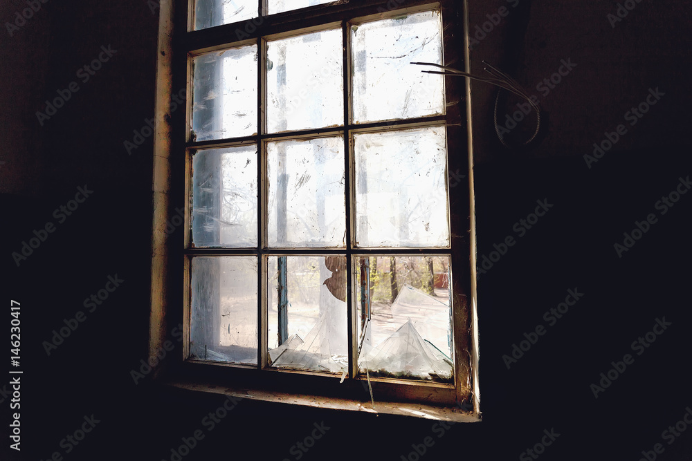 Naklejka premium Broken window glass