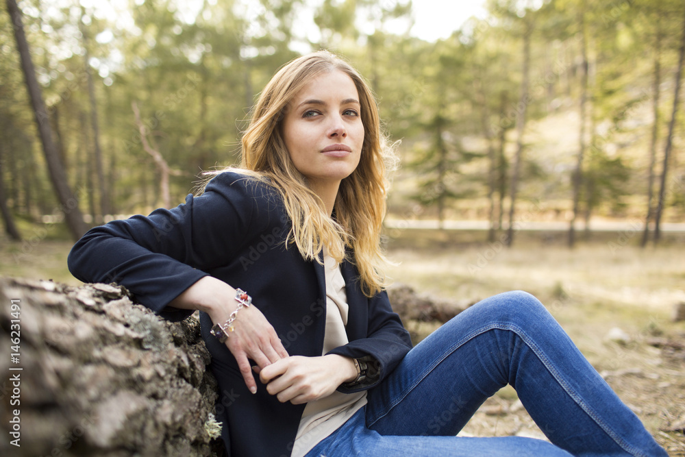 Image of pretty businesswoman looking at camera on natural space Image of pretty businesswoman looking at camera on natural space