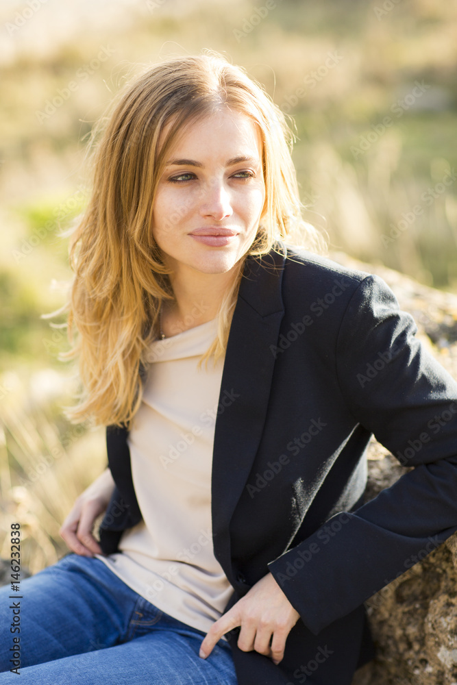 Image of pretty businesswoman looking at camera on natural space Image of pretty businesswoman looking at camera on natural space
