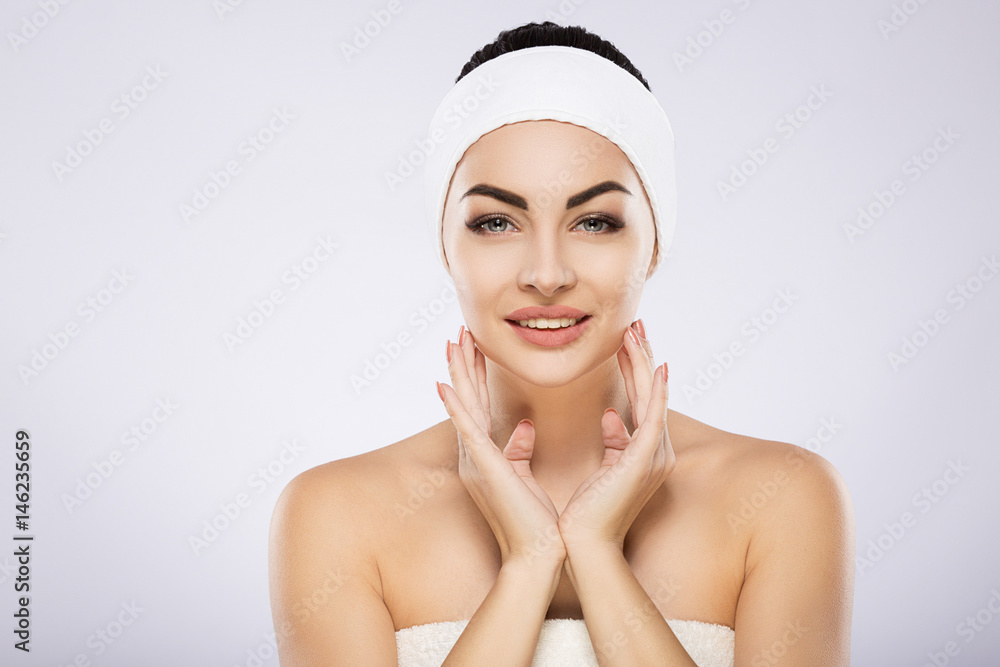 Girl with nude make up at studio background Girl with nude make up at studio background
