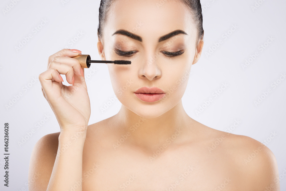 Beautiful girl with nude make up at studio Beautiful girl with nude make up at studio