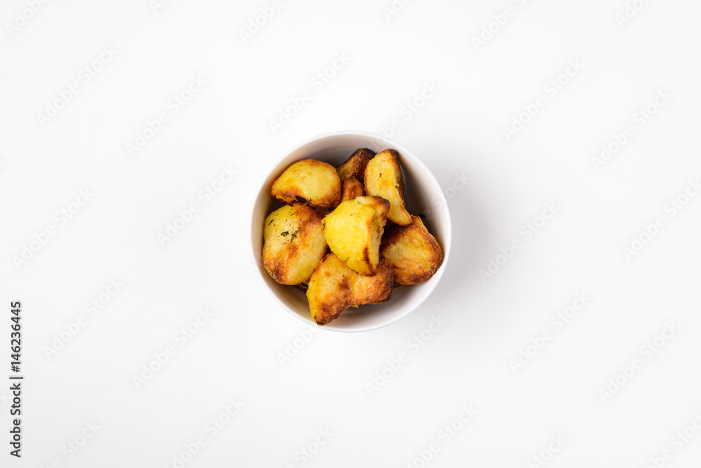 Roast Potato in white bowl Roast Potato in white bowl