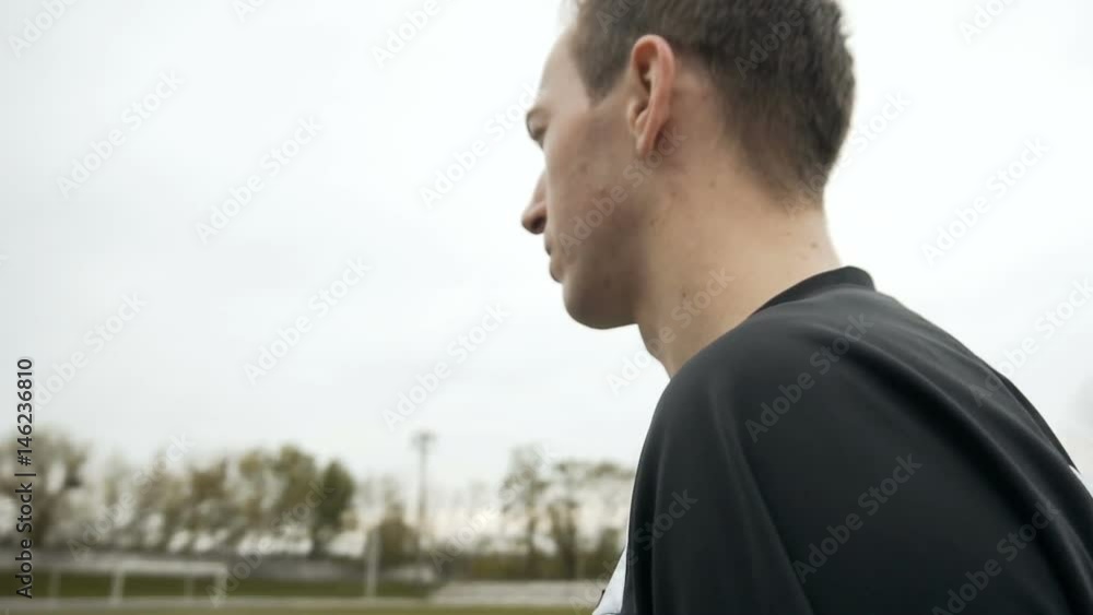 Young attractive man wears yellow sunglasses, runner starts to run, jogging style Young attractive man wears yellow sunglasses, runner starts to run, jogging style