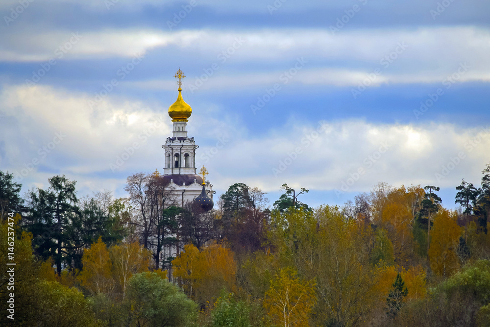 Orthodox church in the autumn forest