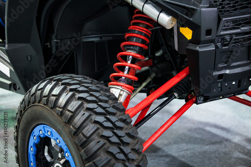 Valokuva Selective focus shock absorber of buggy car in parking