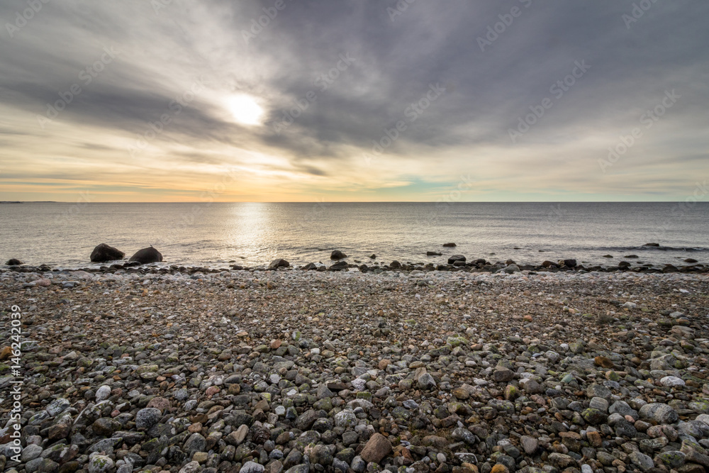Ocean view from the pebble shore in the island of Jomfruland in Jomfruland National Park, Kragero, Norway Ocean view from the pebble shore in the island of Jomfruland in Jomfruland National Park, Kragero, Norway