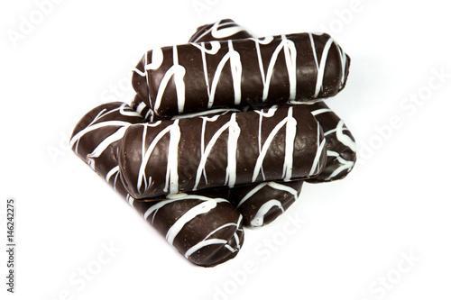 Pale of chocolate glazed cookies isolated on white background