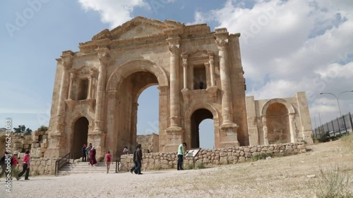 people walking in the antique site of jerash photo