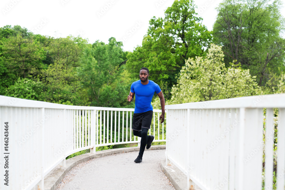 Running man - African American man in Black and Blue clothes Running man - African American man in Black and Blue clothes