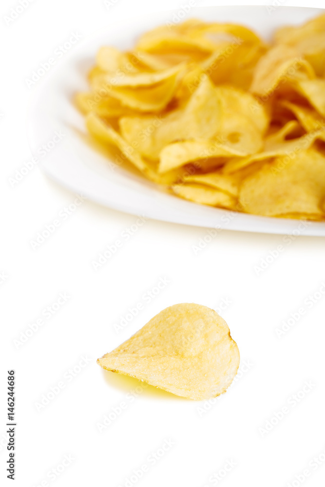 Crispy potato chips isolated on white background close-up Crispy potato chips isolated on white background close-up
