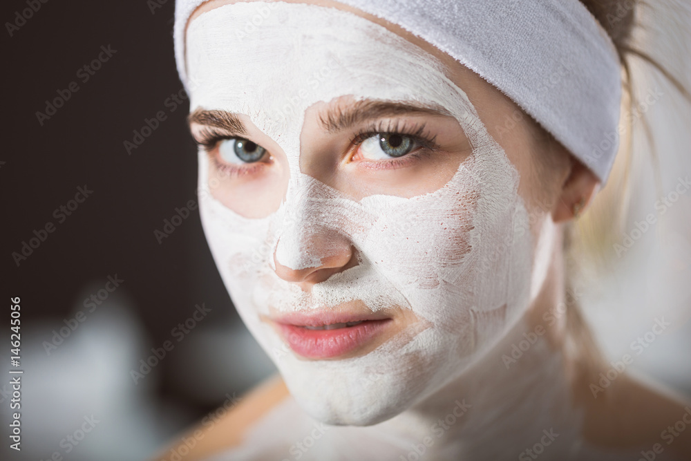 Young woman at enzymatic peeling therapy in spa Young woman at enzymatic peeling therapy in spa