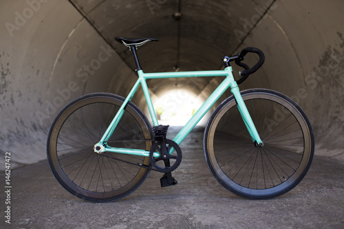 City bicycle fixed gear and concrete wall