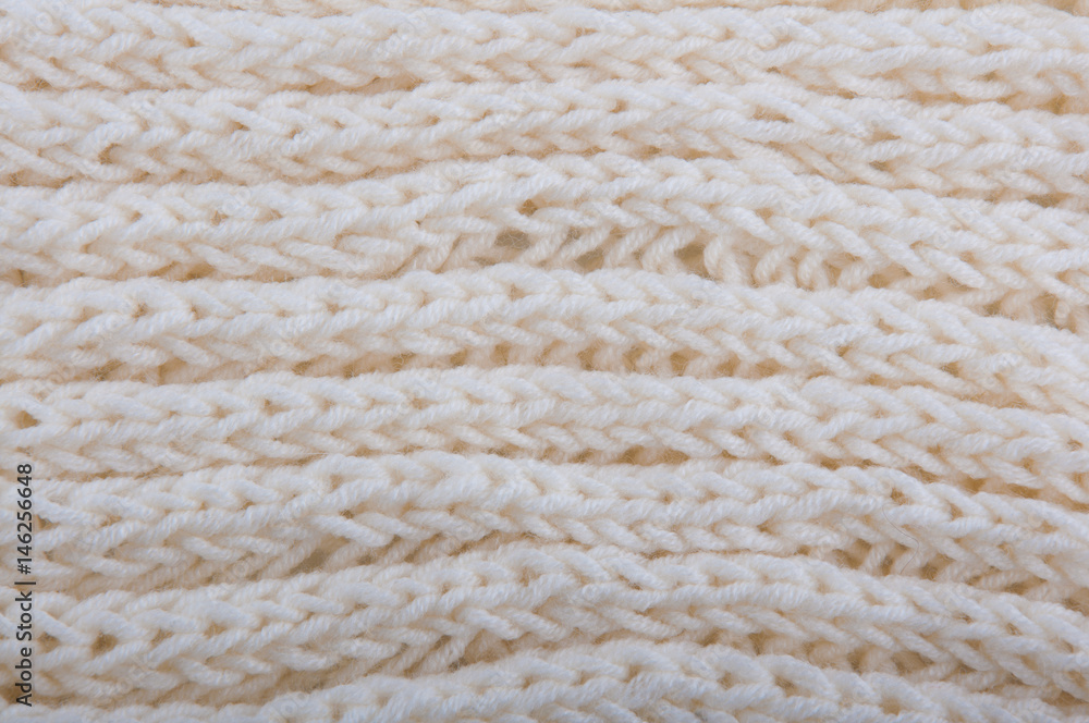 Handknitted canvas made of creamy knitwear Handknitted canvas made of creamy knitwear