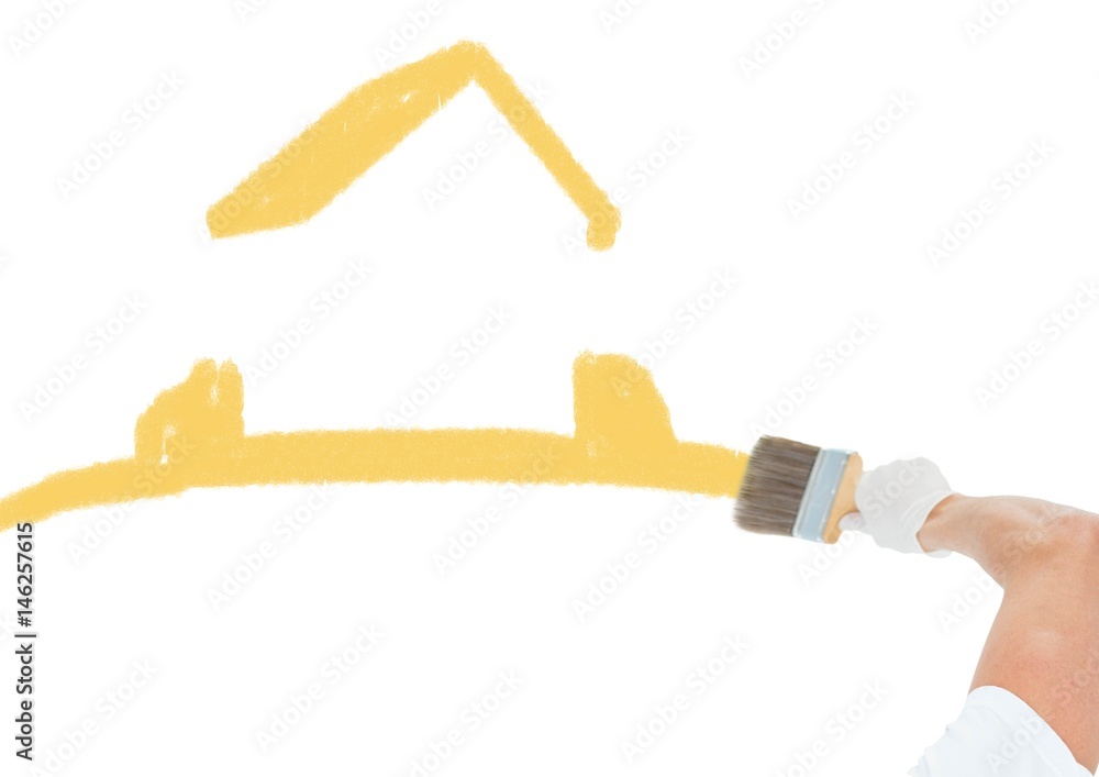 hand with paint brush, painting yellow house hand with paint brush, painting yellow house