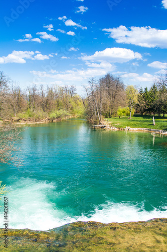  Beautiful landscape, waterfall, clear green water and on Mreznica river in Croatia, panoramic view. 